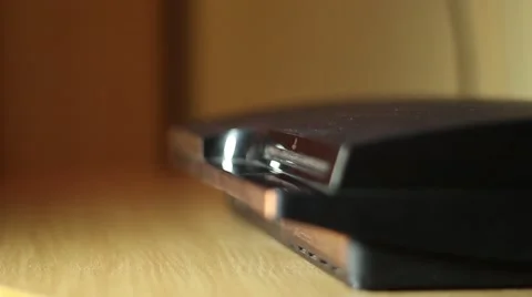 Putting CD to the game console Stock Footage 57019515