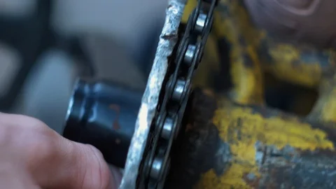 Putting chain onto bicycle sprocket. Stock Footage 94636146