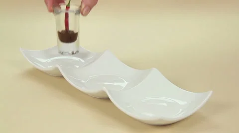 Putting Chilli Glasses On Tray Stock Footage 1086060