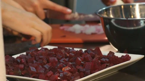 Putting chopped onion to beet Video stock 82025209