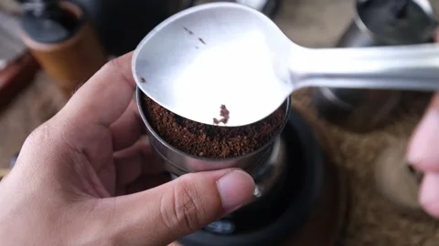 Putting coffee into the basket of mokapot. Stock Footage 297435656