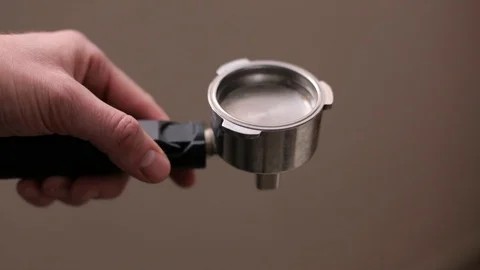 Putting coffee on a coffee machine Stock Footage 107433672