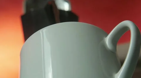 Putting coffee in a cup Stock Footage 68537895