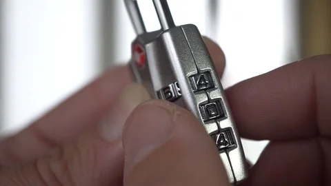 Putting the Combination of the Padlock, Macro Stock Footage 120391938