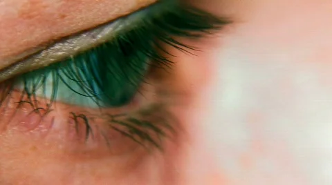 Putting on contact lenses Stock Footage
