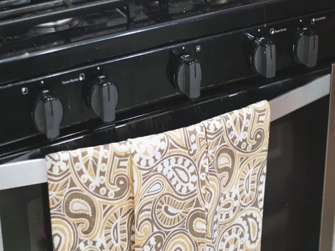 Putting cookies in the oven Stock Footage 80740105