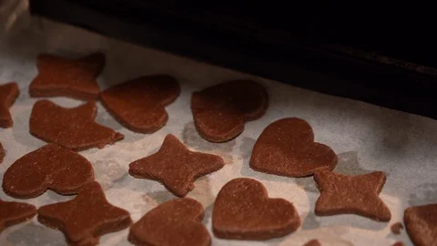 Putting cookies in the oven Stock Footage 127188220