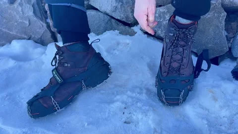Putting on crampons Stock Footage 270320607