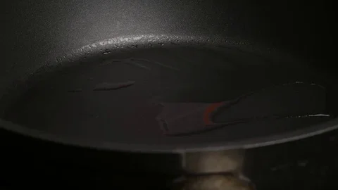 Putting cutted tomato to pan. Stock Footage 70996983