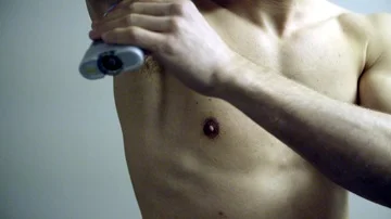 PUTTING ON DEODORANT Stock Footage 86127972