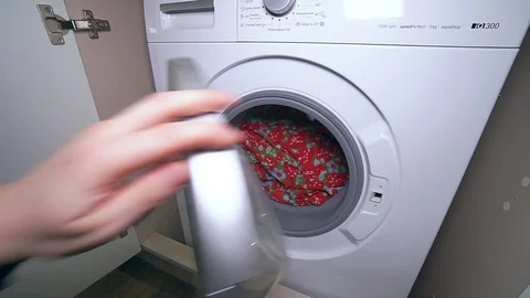 Putting dirty Laundry in the washing machine 스톡 동영상 120287538