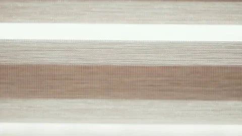 Putting down the blinds on the window. Stock Footage 164894691