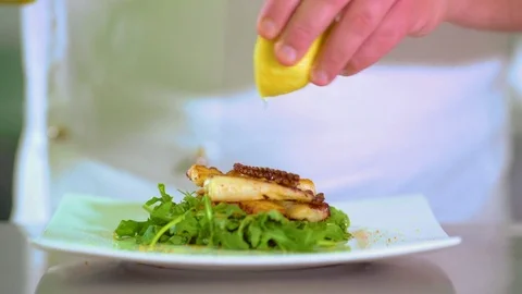 Putting dressing on the octopus salad Stock Footage 71943826