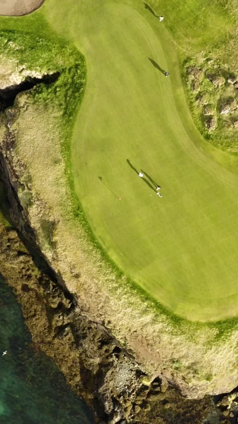 Putting on the Edge: Scenic Cliffside Golf Course Stock Footage 340546004