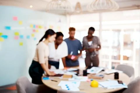 Putting in the effort, time and collaboration. Defocused shot of a group of Stock Photos