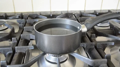 Putting Eggs on to Boil Stock Footage 111096874