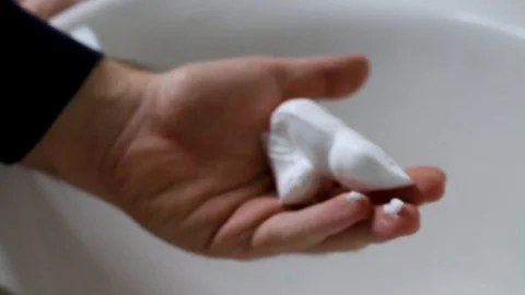 Putting face foam on hand Video stock 101593358