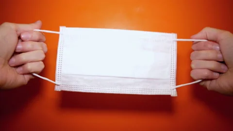 Putting a first-person protective mask on the camera lens. Stock Footage 128979058