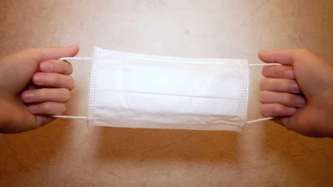 Putting a first-person protective mask on the camera lens. Stock Footage 128979130