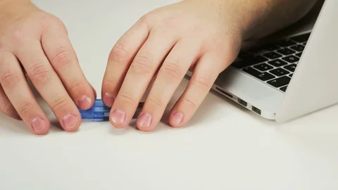 Putting Flash Memory Card Into an Adapter Stock Footage 70994415