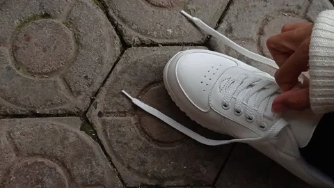 Putting a flower into a small vase Stock Footage 146254732