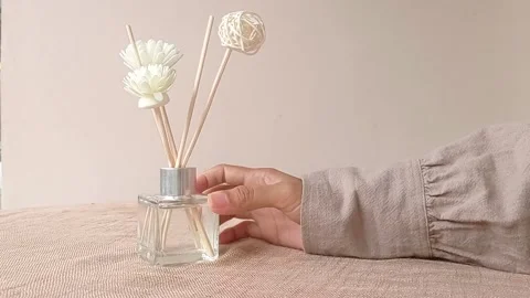 Putting a flower into a small vase Stock Footage 146256132