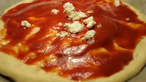 Putting Fresh Mozzarella on Pizza in 50p Stock Footage 336752998