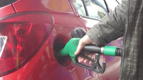 Putting gasoline in the car Stock Footage 43321766
