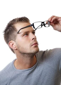 Putting on glasses Stock Photos