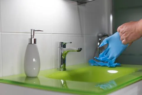 Putting on gloves for prevention Stock Photos