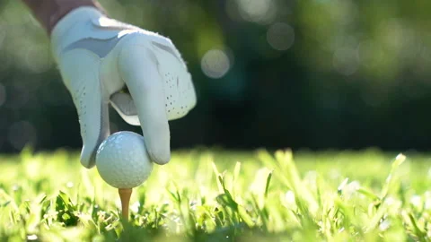 Putting golf ball on green grass Video stock 132859031