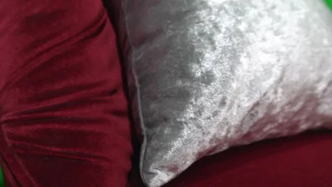 Putting grey cushion on red couch sofa. Furniture and decoration concept Video stock 251512326