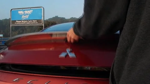 Putting groceries in trunk Stock Footage 45289128
