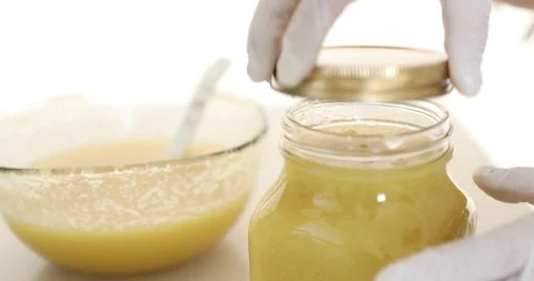 Putting ground pear and ginger into glass Stock Footage 127897490