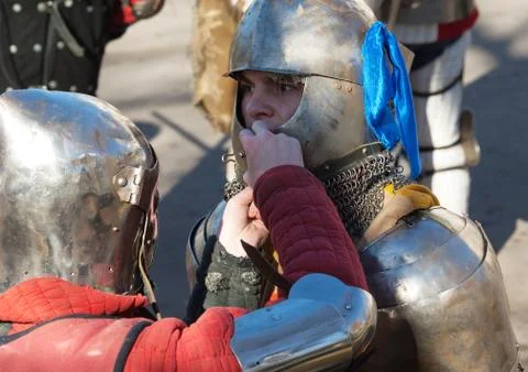 Putting on a helmet Stock Photos