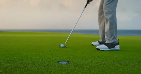 Putting into the hole Stock Footage 102410351