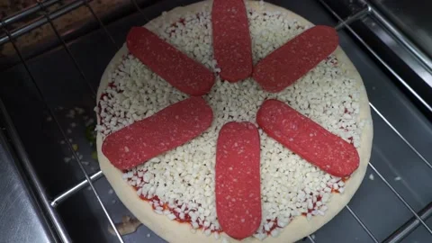 Putting ingredients on pizza close-up Stock Footage 187163728