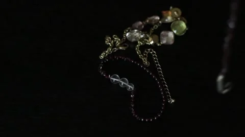 Putting jewelry on a table 動画素材 66753277