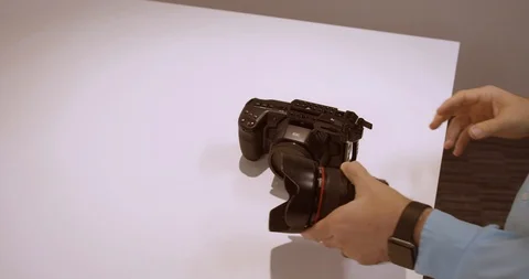 Putting Lens on New Camera Stock Footage 114047606
