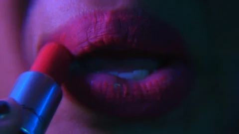 Putting on lipstick Stock-Footage 87140621