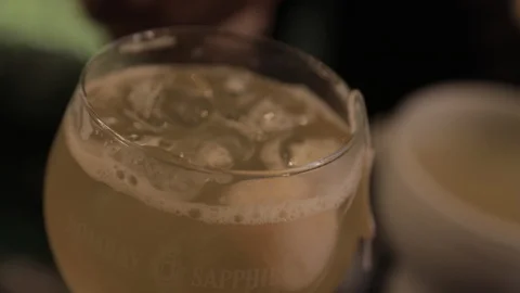 Putting Lychees in Syrup In Gin Chocktail Stock Footage 129782190