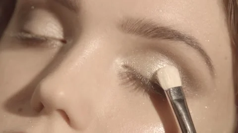 Putting make up in slow motion Stock Footage 67857346
