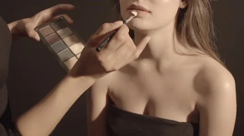 Putting make up in slow motion Stock Footage 67858871
