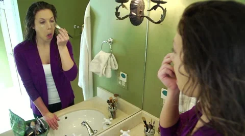 Putting on Make-up Timelapse Stock Footage 21931902