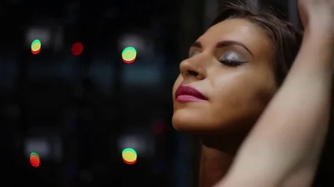 Putting make-up on young beautiful womans face while preparing for a contest Stock Footage 70045171