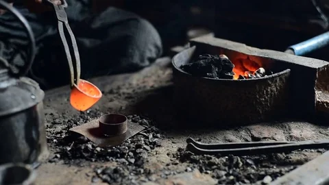 Putting melted silver to the form Stock Footage 71167302