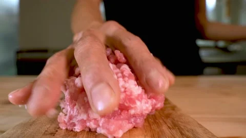 Putting minced beef on a cutting board, Cooking Gyoza Japan Stock-Footage 234573999