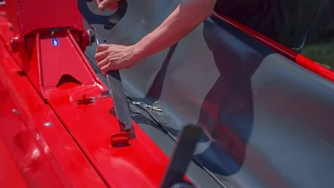 Putting a missing part on the agricultural machinery Stock Footage 70833289