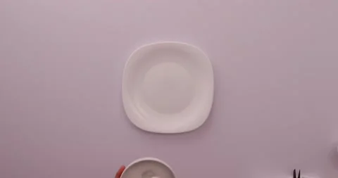 Putting mixture on plate 1 Stock Footage 132210917