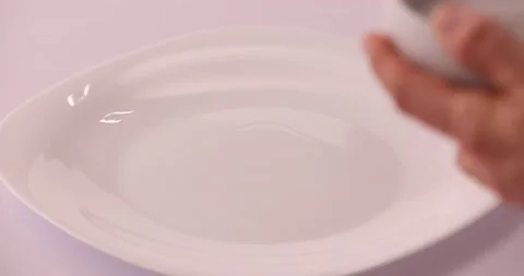 Putting mixture on plate 2 Video stock 132210980